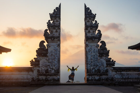  Pula Lempuyang or Lempuyang Temple located on the slopes of Mount Lempuyang, a high-altitude temple in the area, with the famous door and  Mount Agung as a backdrop, Karang Asem District, Bali