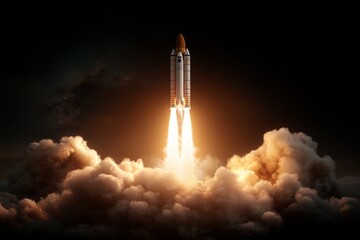 Obraz premium Rocket launch illuminates the night sky with powerful flames and clouds of smoke at a space center