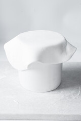 Covering a cake with fondant, paneling a Styrofoam cake dummy with fondant icing