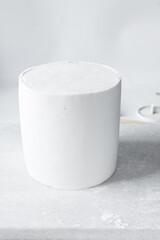 Covering a cake with fondant, paneling a Styrofoam cake dummy with fondant icing