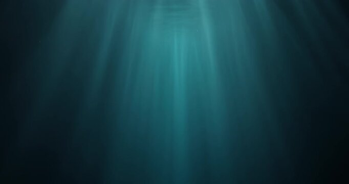 Stunning 4K slow-motion footage of underwater god rays piercing the ocean surface, with enchanting beams of light flickering. Ideal VFX background for diving, snorkeling, and summer adventures.
