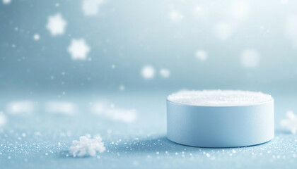 A frosty cake disc surrounded by falling snowflakes.
