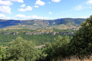Landscape of Millau, France. Mountains and blue sky with white clouds, Gorges du Tarn