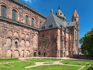 Fototapeta premium Worms, Germany. Fragment of St. Peter's Cathedral (Worms Cathedral). View from south-west on chapel of St. Nicholas and relicts of the cloister. The cathedral was built from about 1130 to 1181.