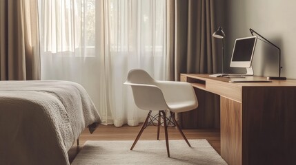 Modern bedroom with desk, chair, and computer.