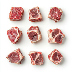 Freshly cut meat cubes arranged neatly on a white background ready for cooking or meal preparation