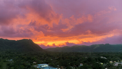  Aerial view of the small village of Anton Valley Panama at sunset with a beautiful and colorful sky.