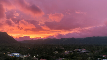 Obraz premium Aerial view of the small village of Anton Valley Panama at sunset with a beautiful and colorful sky.