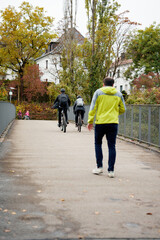 Fototapeta premium Active holidays in Germany. Cycling. People ride bicycles, both adults and children.