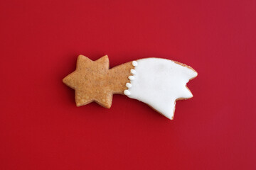 Gingerbread comet on a red background