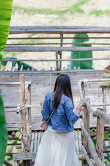 woman walking forward on the path to her intended destination and her journey along the path is a good exercise. feet walking along the path is the concept of walking to her destination and success.