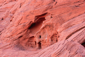 A large rock with a hole in it