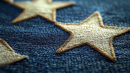 embroidered stars on denim material.