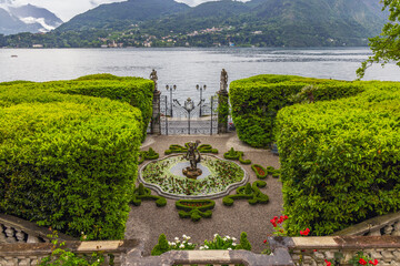 View from the palace to Lake Como and the entrance to the park in the gardens of Villa Melzi in...
