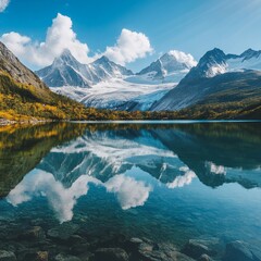 Fototapeta premium Majestic mountains and a tranquil lake reflect underneath a vibrant blue sky in a scenic natural landscape