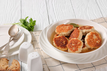 turkey potato cakes in white bowl, top view