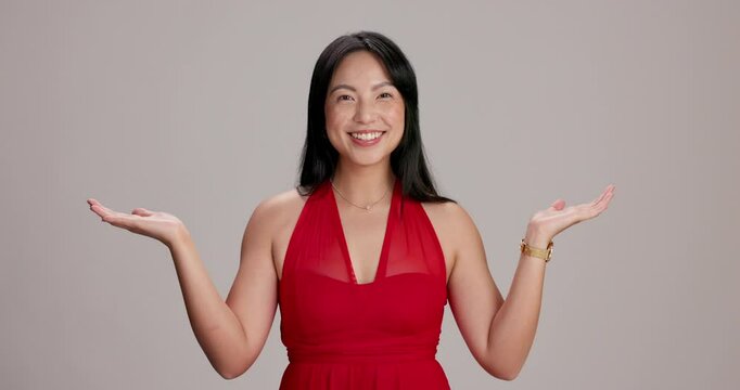 Face, options and woman with hand gesture, decision and model on gray studio background. Portrait, person or lady with choice, expression or comparison with opportunity, questions or versus with idea
