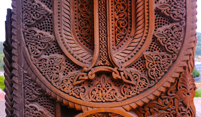 A beautifully detailed wooden carving proudly showcasing exceptional artistic craftsmanship and rich cultural motifs