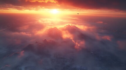 Fototapeta premium Sunset Over Snowy Mountains And Cloudscape