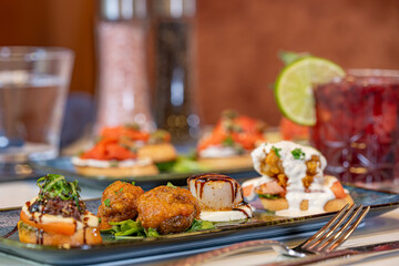 Assorted tapas including meatball and scallop with wine pairings