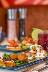 Assorted tapas including meatball and scallop with wine pairings