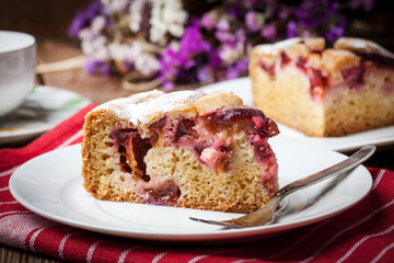 Piece of homemade fresh plum cake.
