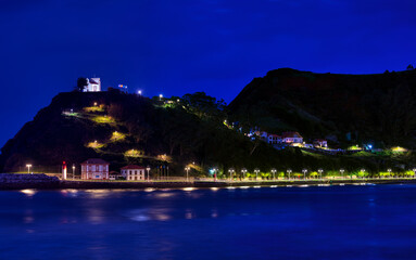 Ribadesella with Hermitage of Guia on a blue hour.