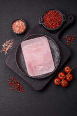 Naklejka premium Ham cut into square slices for making delicious nutritious sandwiches
