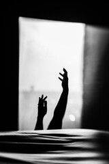 silhouette of arms