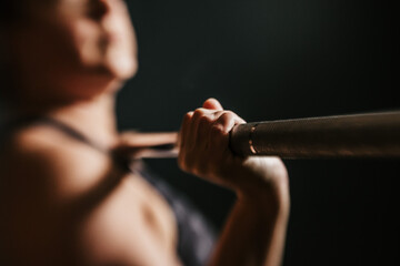 woman with workout bar