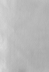 Texture of genuine leather, artificial leatherette grey background