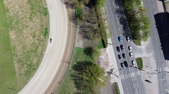 Aerial footage of a chariot training on the circuit at Tallinn Hippodrome in Tallinn city, Estonia