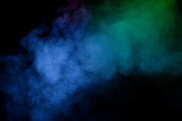 Blue and green steam on a black background.
