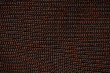 Brown sweater texture as a background.