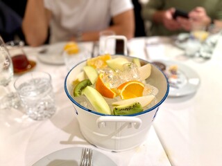 Fruit salad with ice box at fish restaurant