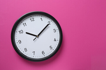 Big beautiful stylish clock on color background