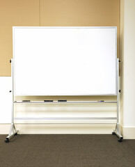 empty white board with markers in the office