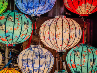 Traditional Vietnamese paper lanterns lighted in Hoi An ancient town streets. Vietnamese culture and lanterns at Hoi An city Vietnam © Audrius