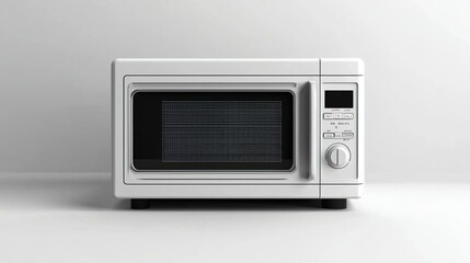 Fototapeta premium Compact microwave oven with digital display, set against a white background with sharp, clean lines in stock photo style.