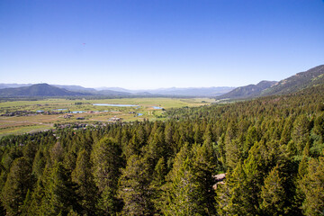 aerial views from the tram in jackson hole wyoming overlooking the teton valley in summer 