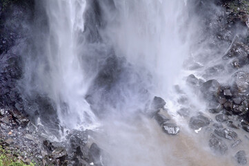 Caracol Falls, a 130 meters waterfall, formed by the Caracol River and cuts out of basalt cliffs in the mountain range, one of most popular natural tourist attraction in Brazil, RS, Canela, 2016