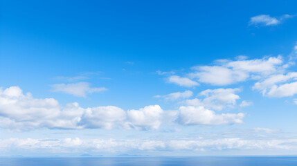 Obraz premium Boundless Azure: An Expanse of Clear Blue Sky Merging with the Horizon