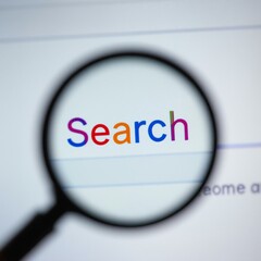 Magnifying Glass Focused on the Word 'Search