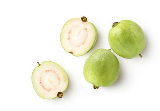 Flat lay of guava fruit with cut in half isolated on white background. Clipping path.