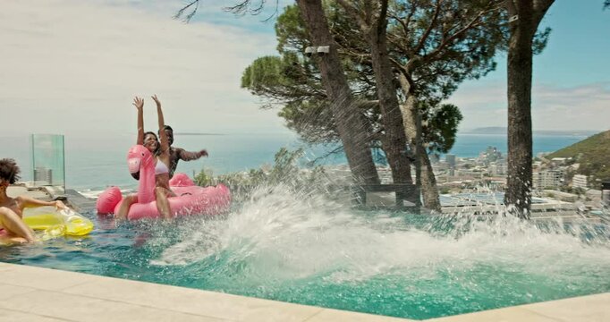 Jump, splash and swimming pool with friends at party for summer celebration, travel and vacation. Happiness, fun and relax with group of people at hotel resort for new year holiday and swimwear