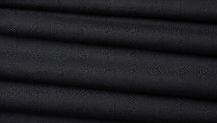 Obraz premium Black textured fabric with a subtle woven grid pattern, suitable for backgrounds, design elements, and textile concepts in creative projects
