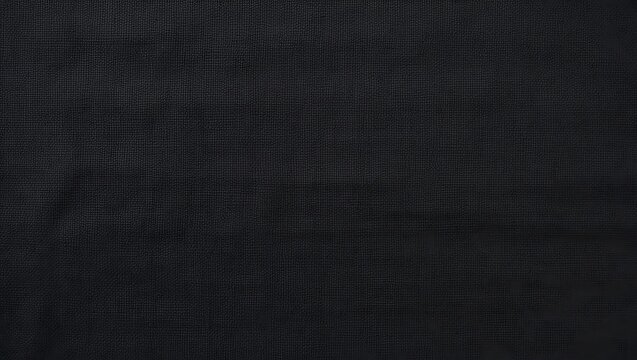 Black textured fabric with a subtle woven grid pattern, suitable for backgrounds, design elements, and textile concepts in creative projects