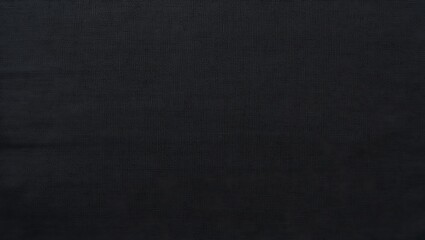Fototapeta premium Black textured fabric with a subtle woven grid pattern, suitable for backgrounds, design elements, and textile concepts in creative projects
