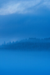 Fototapeta premium Evening by the Kauserudtjernet Lake, Toten, Norway, in Decmber.