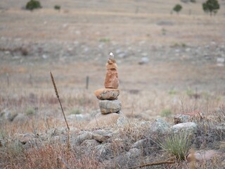 Stacked stones on prairie trails, Boulder, Colorado